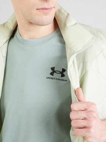 Maglia funzionale di UNDER ARMOUR in verde