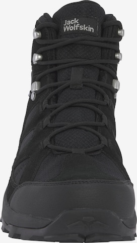 JACK WOLFSKIN Boots in Black