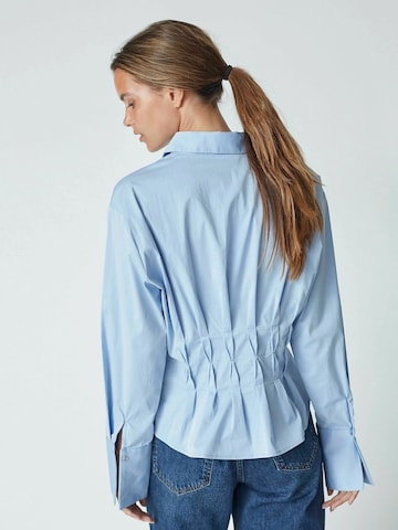 Maglietta 'Poppy' di co'couture in blu