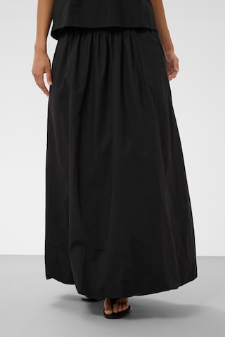 SOAKED IN LUXURY - Falda 'SLAlmeda' en negro: frente
