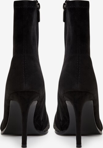 CESARE GASPARI Ankle Boots in Black