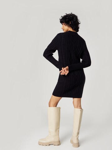 florence by mills exclusive for ABOUT YOU Úpletové šaty 'Indira' – černá