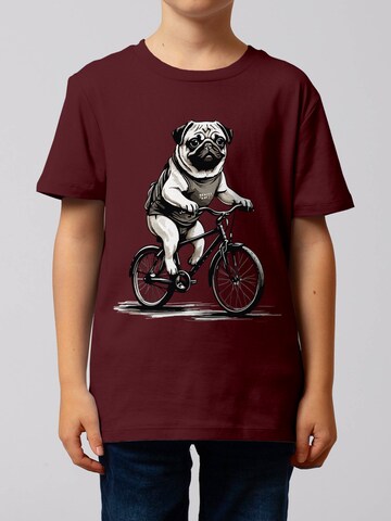 watabout.kids Shirt 'Mops auf Fahrrad' in Rood: voorkant