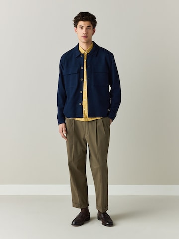 Next Tussenjas in Blauw