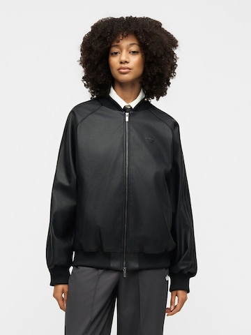 ADIDAS ORIGINALS Преходно яке 'SST' в черно: отпред