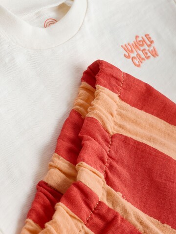 Set Next en orange