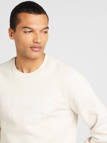 Sweat-shirt 'BEAU' GUESS en beige