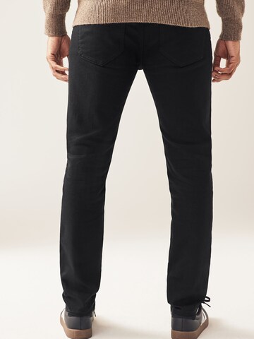 Skinny Jeans 'Essential' di Next in nero