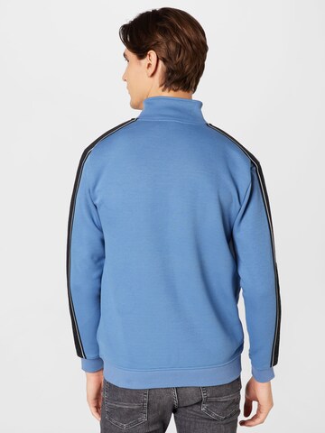 GUESS Sportsweatjacke 'MICKEY' in Blau