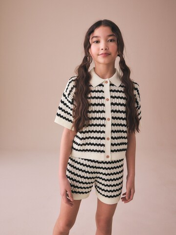 Next Set in Black: front