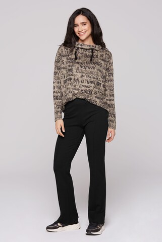 Soccx Slimfit Flared Jerseyhose mit Biese in Schwarz