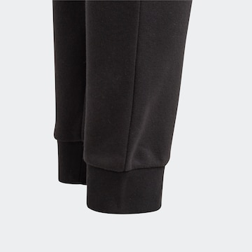 Tapered Pantaloni 'Fleece' di ADIDAS ORIGINALS in nero