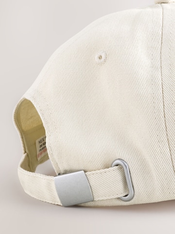 Next Cap 'Edit' in Blau