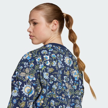 ADIDAS ORIGINALS Sweatshirt 'Liberty London' in Blauw