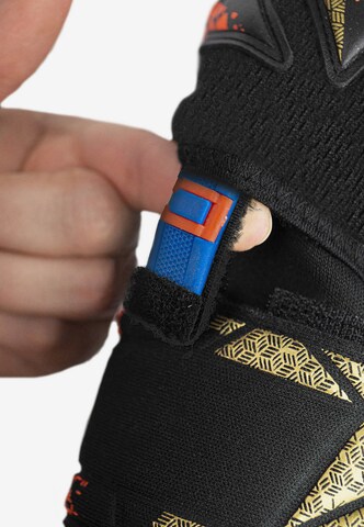 REUSCH Sporthandschoenen 'Attrakt SpeedBump Ortho-Tec' in Goud