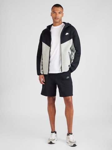 juoda Nike Sportswear Laisvas Kelnės