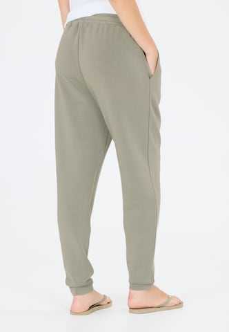 Athlecia Tapered Sportbroek 'Jacey' in Groen