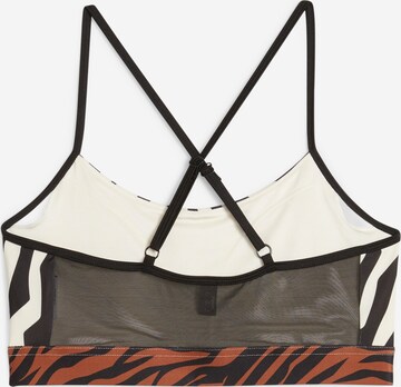 Bustino Reggiseno sportivo 'Move Animal Remix' di PUMA in beige