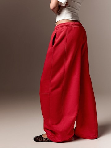 Bershka Wide leg Trousers in Red: side
