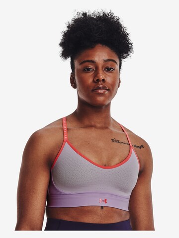 Low support Reggiseno sportivo 'Infinity' di UNDER ARMOUR in lilla: frontale