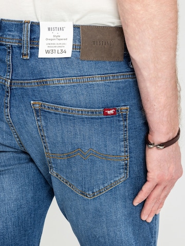 Tapered Jeans 'Mustang Style Oregon Tapered Denim Blue 1018014 5000 782' di MUSTANG in blu