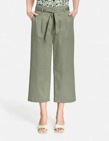 GERRY WEBER Loose fit Pleat-front trousers in Green: front