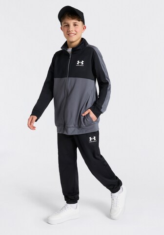 UNDER ARMOUR Trainingsanzug in Schwarz: Vorderseite