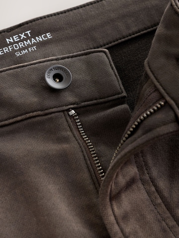 Slimfit Jeans di Next in marrone