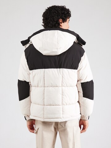 JACK & JONES Kurtka zimowa 'COURBAN PUFFER' w kolorze beżowy