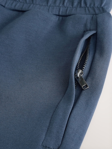 NextBaggy Hlače - plava boja