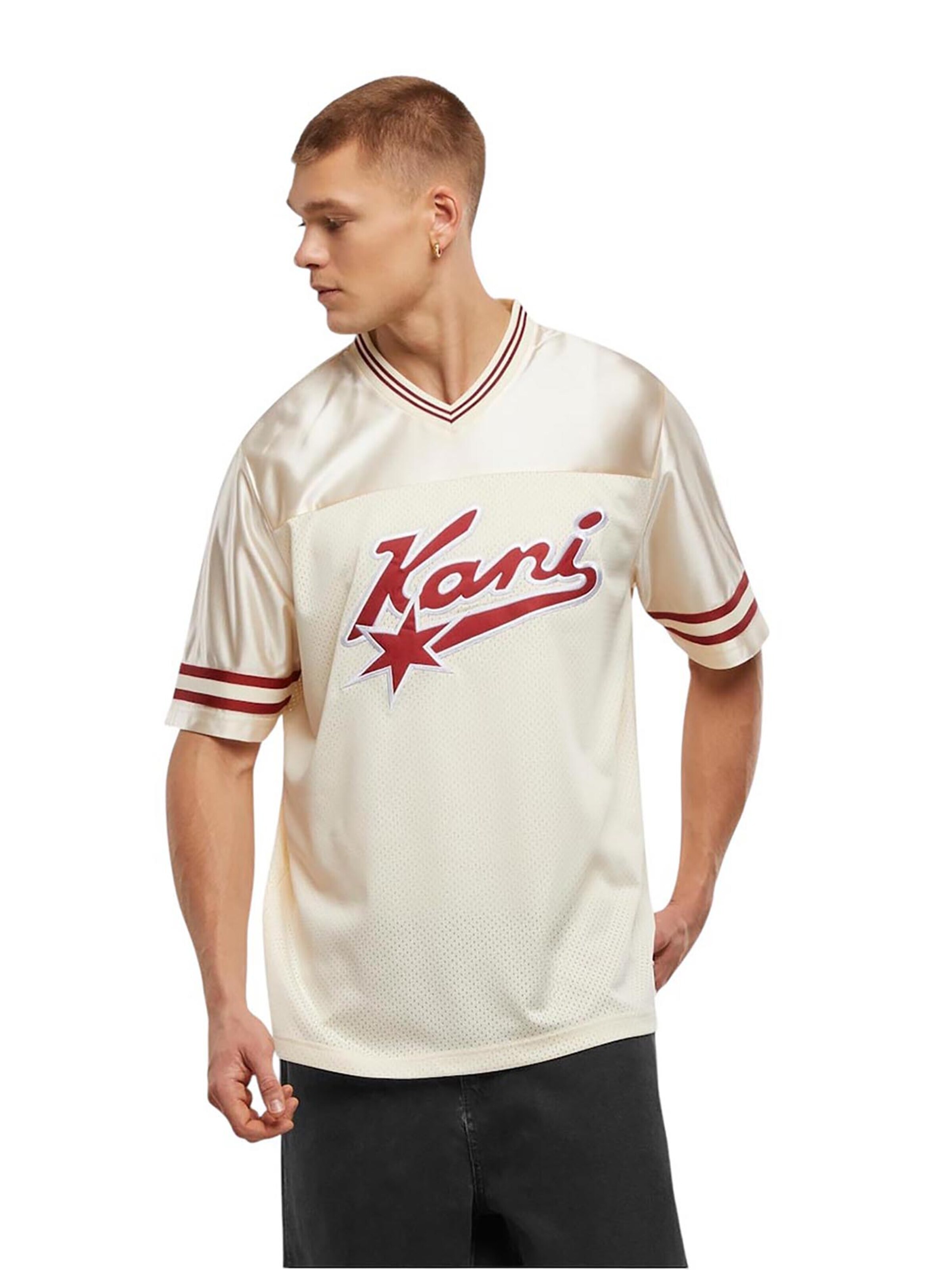Karl Kani Koszulka 'Varsity' w kolorze beżowy