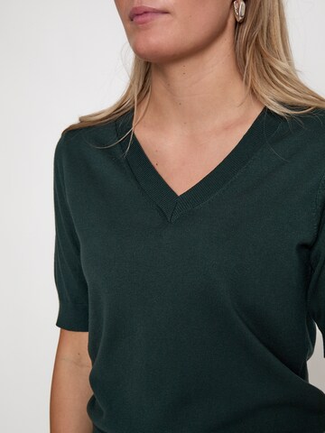 Top 'Milla' di minus in verde