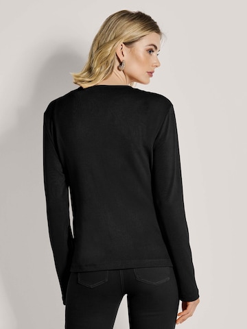 MADELEINE Gebreid vest in Zwart