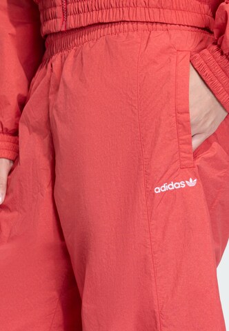 ADIDAS ORIGINALS Wide leg Trousers in Red