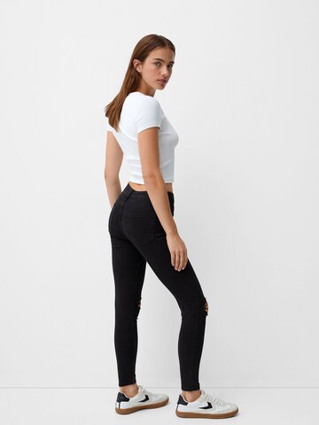 Bershka Skinny Džínsy - Čierna