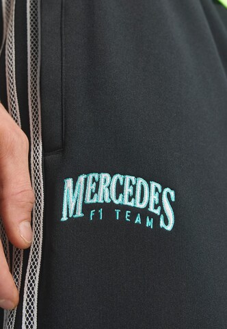 Loosefit Pantaloni sportivi 'Mercedes - Amg Petronas Formula One Team Las Vegas' di ADIDAS PERFORMANCE in nero
