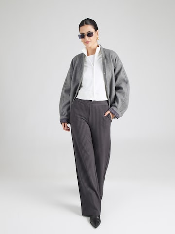 Veste de survêtement Tommy Jeans en blanc