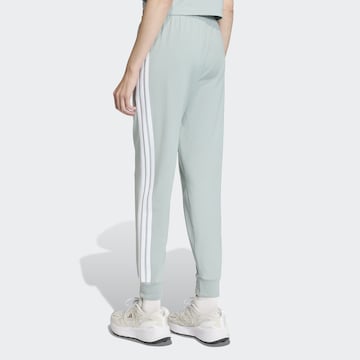 ADIDAS SPORTSWEAR Tapered Workout Pants 'Essentials' in Green