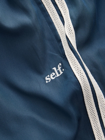 self. - Pierna ancha Pantalón en azul