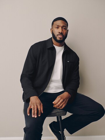 Next Between-Season Jacket 'Motionflex' in Black