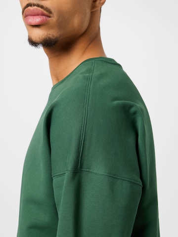 Kosta Williams x About You Sweatshirt in Green