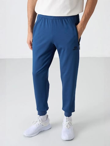 Pantaloni di Tommy Life in blu: frontale