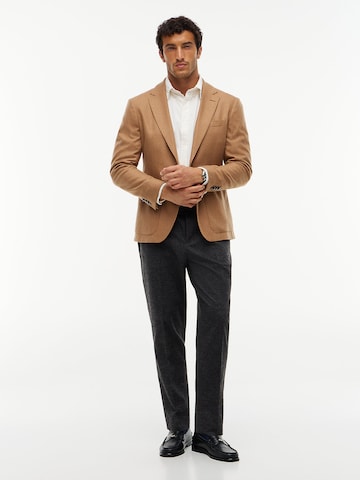 TOMMY HILFIGER Tapered Bandplooibroek 'New York Label' in Grijs