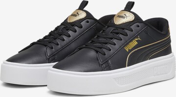 Baskets basses PUMA en noir