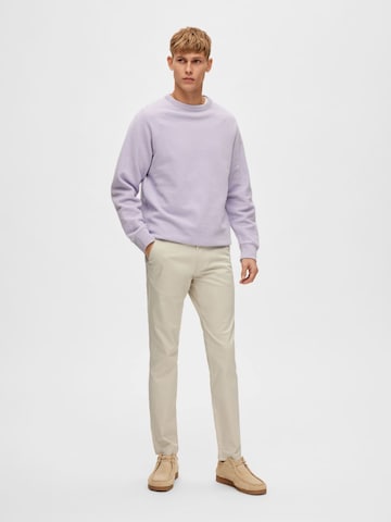 Slimfit Pantaloni '16087663' di SELECTED in beige