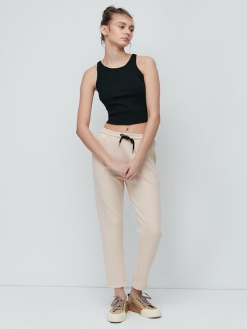 C&City Tapered Trousers in Beige