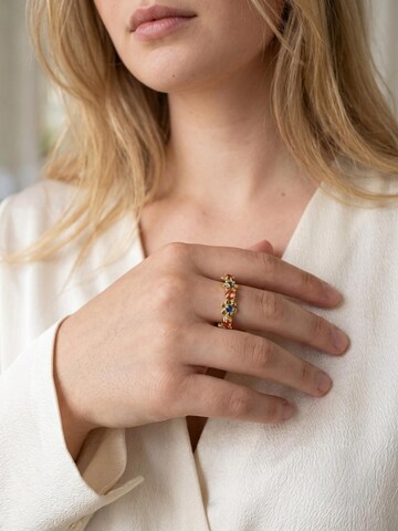 Gloria Mago Ring 'Sw multi-crystal flower ring in gold and blue' in Gold
