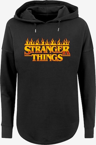 Sweat-shirt 'Stranger Things  Netflix TV Series' F4NT4STIC en noir : devant