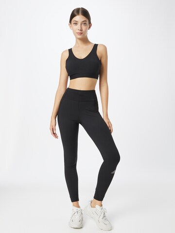 ADIDAS SPORTSWEAR Skinny Sporthose 'Own The Run Winter' in Schwarz