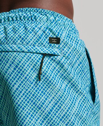 Superdry Kratke kopalne hlače 'Studios' | modra barva